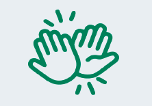 A green outline illustration of two hands giving a high five, with small lines around the hands to indicate motion or excitement.