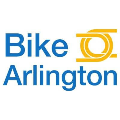 Logo for Bike Arlington. The words "Bike Arlington" appear in blue text, with a yellow abstract graphic of overlapping circles and lines resembling bicycle wheels to the right of the word "Bike.