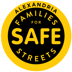 A circular logo with a yellow border and black center. Yellow text reads "Alexandria Families for Safe Streets," with "SAFE" in bold, large letters in the middle.
