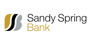 Sandy Spring Bank logo featuring stylized gold, black, and gray “SSB” initials on the left, with “Sandy Spring Bank” text in black and gold on the right against a white background.